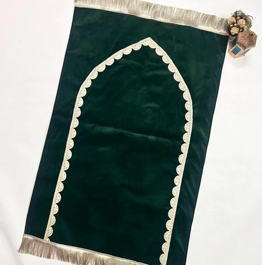 Elegant olive green velvet prayer mat with golden lace trim and personalized name.