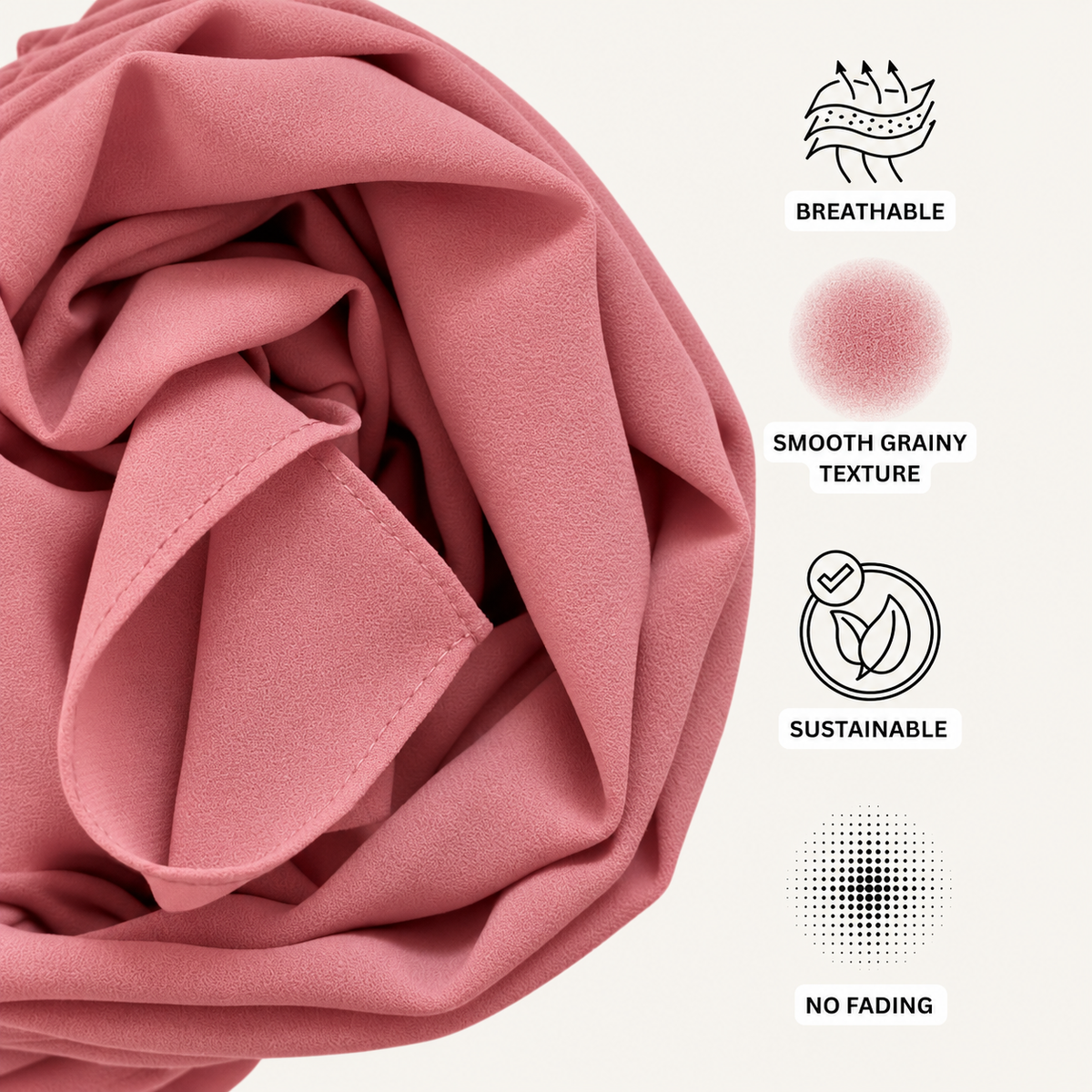 A close-up of dusty pink fabric with text callouts highlighting breathable, smooth grainy texture, sustainable, and no fading qualities.