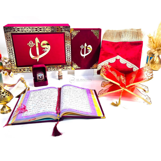 Premium bridal Quran gift set from Al-Hadaya’s Hubb Al-Iman Collection featuring maroon velvet Quran, Turkish prayer mat, resin rehal, tasbih and attar