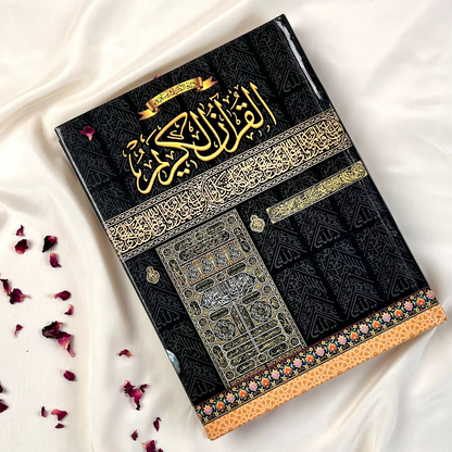 “Kaaba design Quran Al Kareem with golden detailing on hardcover, cream pages”