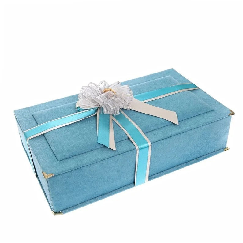 Luxury Islamic Quran gift box in blue velvet with gold detailing and matching accessories.
