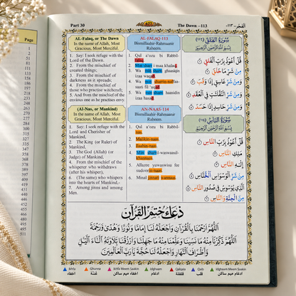 Open Quran page featuring Surah Al-Falaq and Surah An-Naas with Arabic text, English translation, Roman transliteration, colour-coded tajweed markings, and a decorative Islamic border.