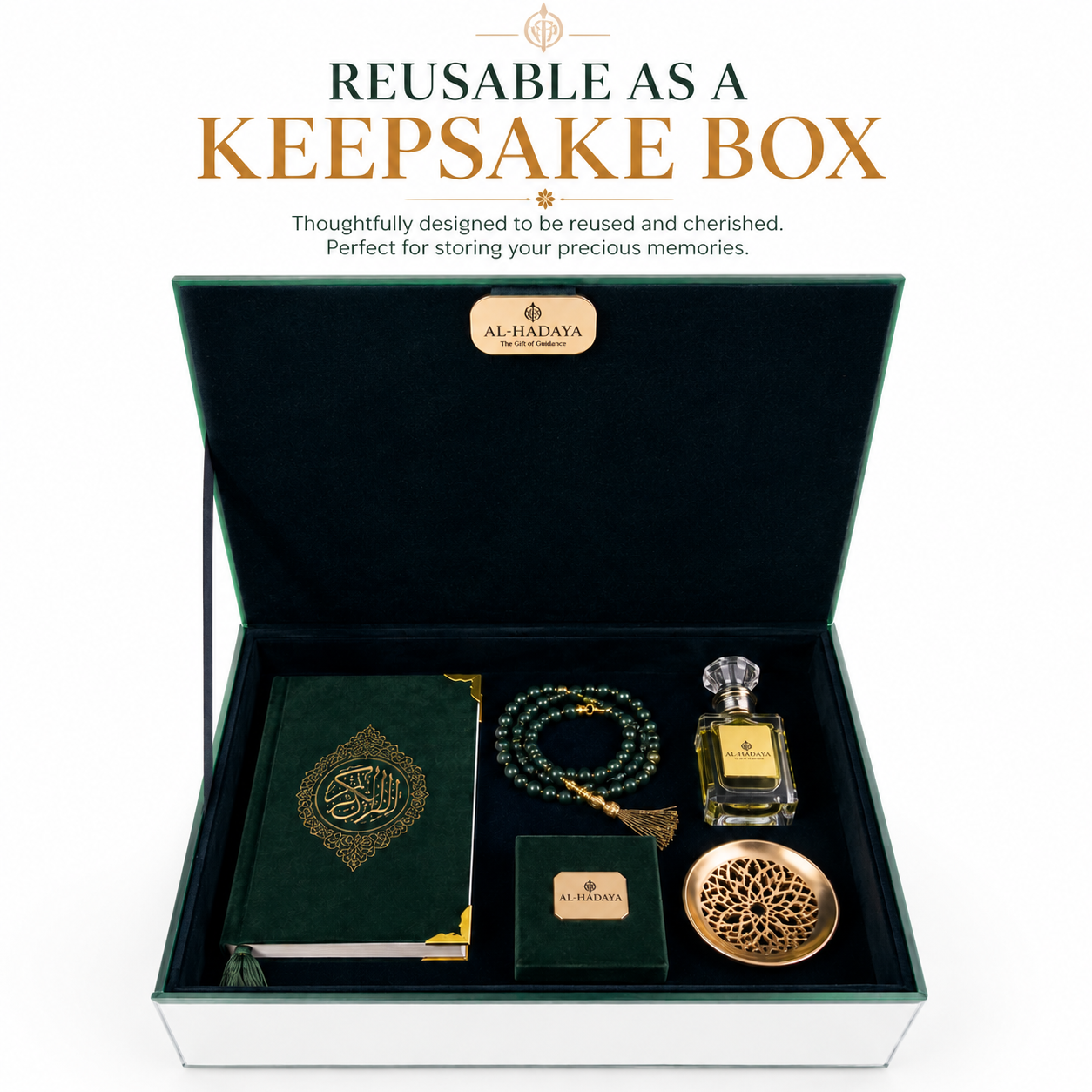 An open keepsake box set from Al-Hadaya, featuring a dark green velvet-lined interior with gold-trimmed storage compartments holding a green book with gold Arabic calligraphy, a green beaded necklace, a small green box, a gold perfume bottle, and a round gold tray. Above the box, text reads 'REUSABLE AS A KEEPSAKE BOX' with a tagline about cherishing memories.