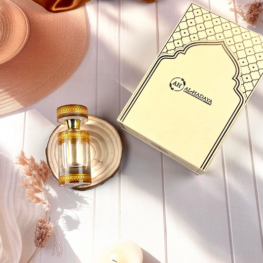 Premium Arabic attar in white crystal packaging with long-lasting oud fragrance.