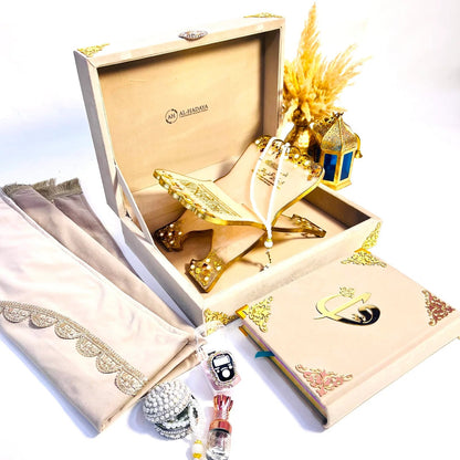 Luxury Hubb Al-Iman Quran gift set by Al-Hadaya with velvet-covered rainbow Quran, Turkish prayer mat, resin rehal, tasbih, attar and velvet box