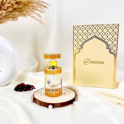 Premium Arabic attar in white crystal packaging with long-lasting oud fragrance.
