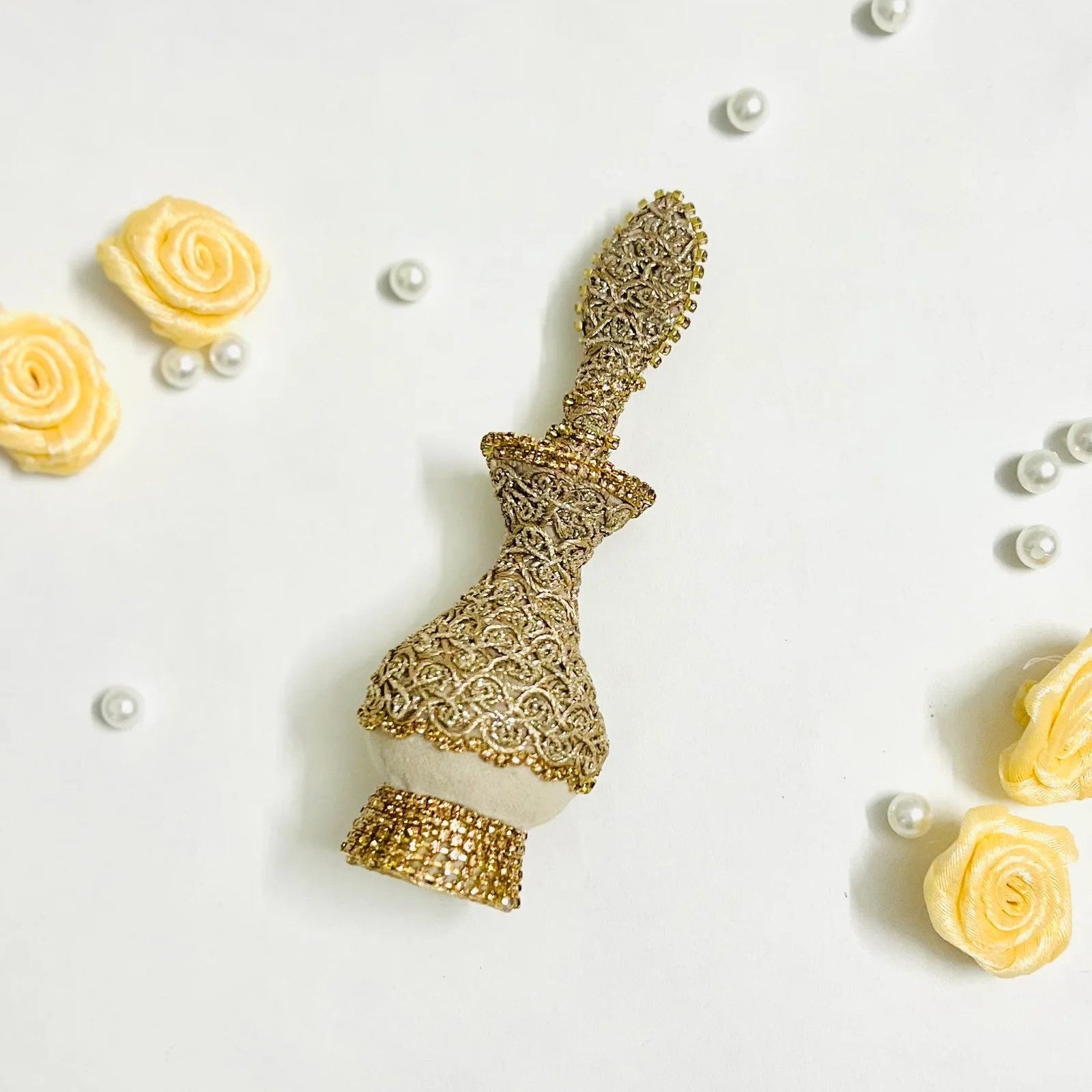 Handcrafted velvet surma dani for decorative and ceremonial use.