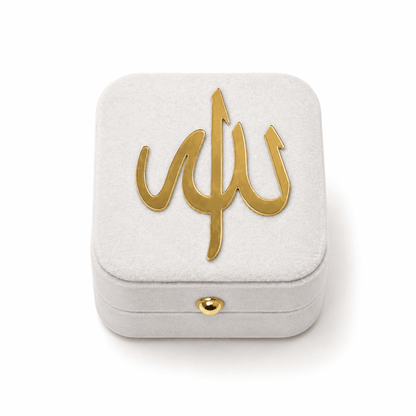 White  box with gold Arabic calligraphy on a white background