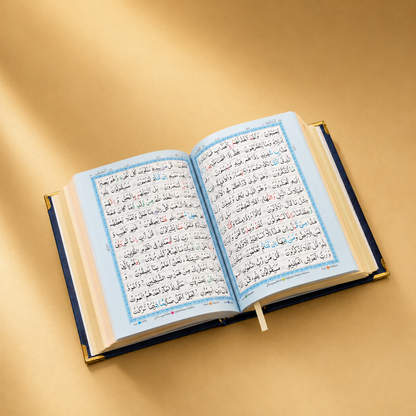 Open quran  with text on a gold background