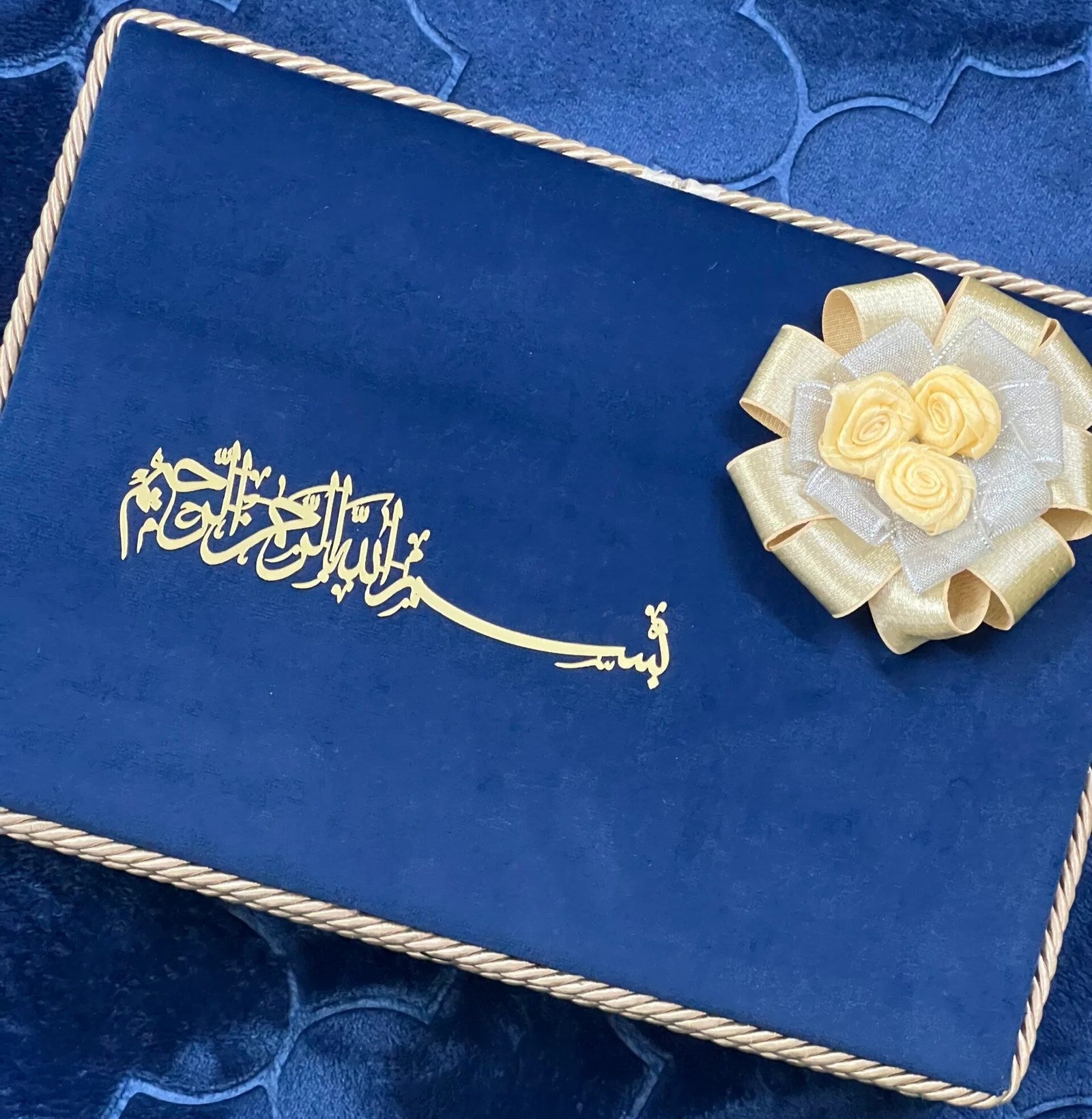 blue velvet quran box with bismillah written on it 