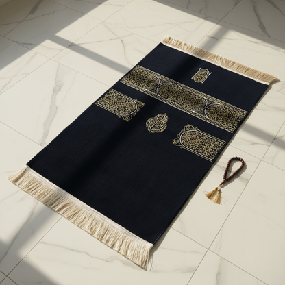 “Premium woven chenille prayer rug with intricate Kaaba Kiswa design and tassels”