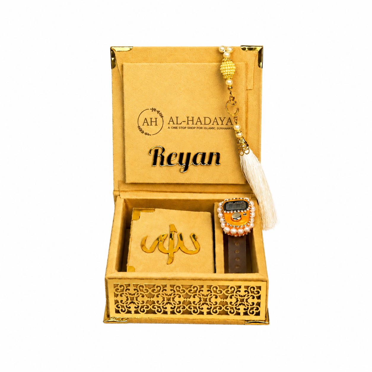Gold box with 'Al-Hadaya' branding, containing a small box and decorative item.