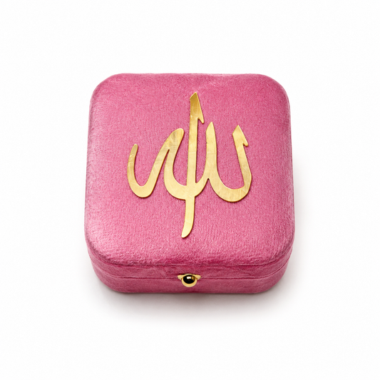 Pink velvet box with gold 'Allah' symbol on a white background