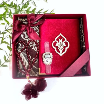 Elegant Red Islamic gift hamper featuring velvet Quran box and Turkish prayer rug.