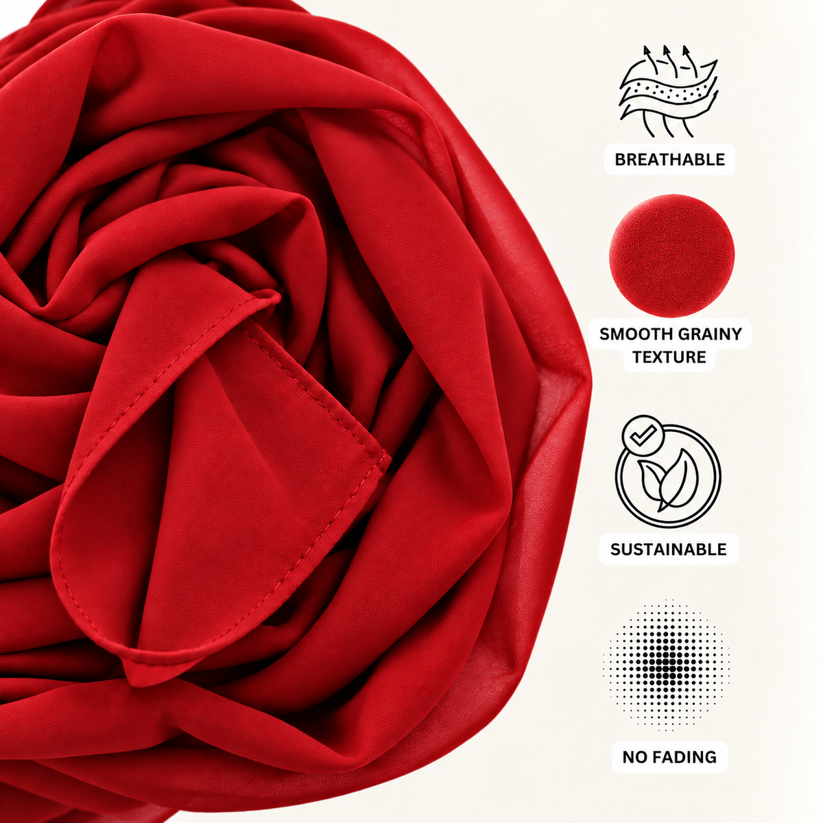 A close-up of a folded red fabric product, likely a scarf or shawl, shown with four feature callouts on a light beige background: breathable texture, smooth grainy texture, sustainable material, and no fading.