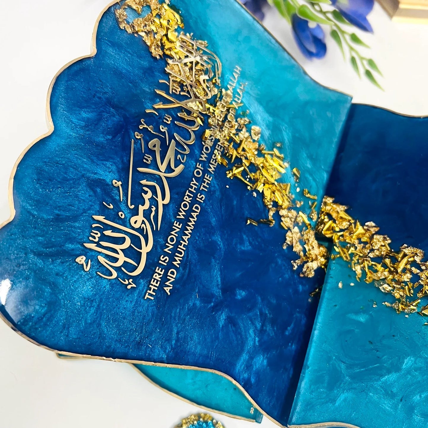 resin rehal with shahada written on it 