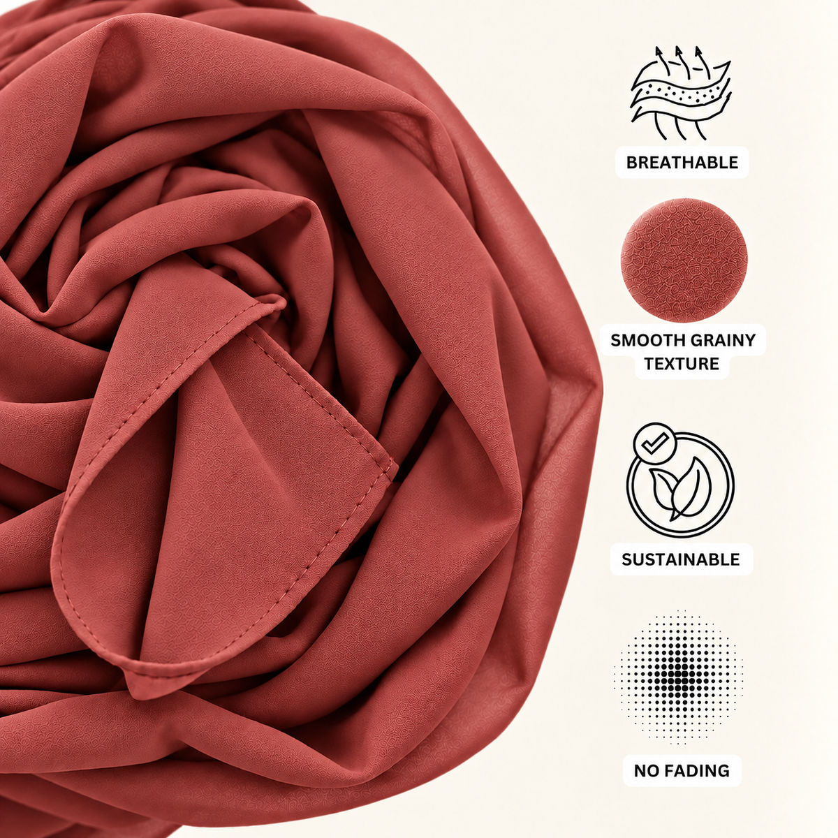 A close-up of draped terracotta-colored fabric with feature callouts on the right, including icons and text for breathable, smooth grainy texture, sustainable, and no fading.