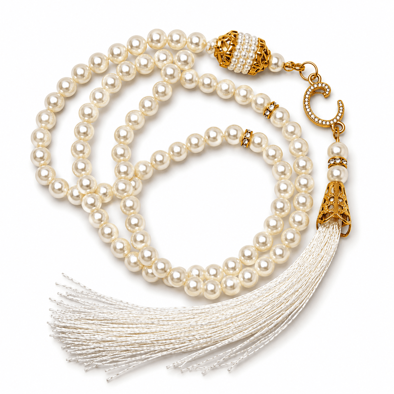 Pearl tasbih with gold clasp and tassel on a white background